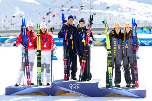 260218 Nadja Kälin and Nadine Faehndrich of Switzerland, Jonna Sundling and Maja Dahlqvist of Sweden and Laura Gimmler and Coletta Rydzek of Germany celebrate on the podium after the women s free technique team sprint cross-country skiing final during day 12 of the 2026 Winter Olympics on February 18, 2026 in Val di Fiemme. Photo: Jon Olav Nesvold BILDBYRAN COP 217 MT0993 skidor cross-country skiing langrenn Olympic Games, Olympische Spiele, Olympia, OS olympics winter olympics os ol olympiska spel vinter-os olympiske leker milano cortina 2026 milan cortina 2026 milano cortina 2026 olympic games milano cortina 2026 winter olympic games milano cortina-os milano cortina-ol vinter-ol 12 bbeng teamsprint jubel sweden sverige *** 260218 Nadja Kälin and Nadine Faehndrich of Switzerland, Jonna Sundling and Maja Dahlqvist of Sweden and Laura Gimmler and Coletta Rydzek of Germany celebrate on the podium after the women s free technique team sprint cross country skiing final during day 12 of the 2026 Winter Olympics on February 18, 2026 in Val di Fiemme Photo Jon Olav Nesvold BILDBYRAN COP 217 MT0993 skidor cross country skiing langrenn olympic games olympics winter olympics os ol olympiska spel vinter os olympiske leker milano cortina 2026 milan cortina 2026 milano cortina 2026 olympic games milano cortina 2026 winter olympic games milano cortina os milano cortina ol vinter ol 12 bbeng teamsprint jubel sweden sverige  Copyright: JONxOLAVxNESVOLD BB260218JE086