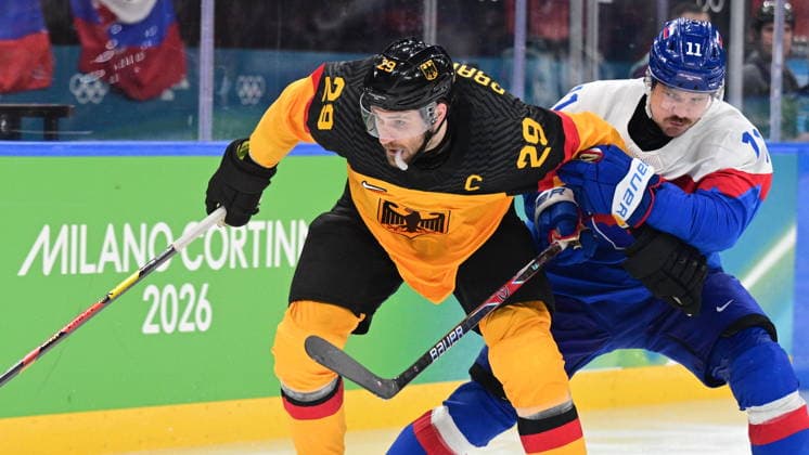 XXV Winter Olympic Games, Olympische Spiele, Olympia, OS in Milan, Italy, on February 18, 2026. Men s Ice hockey, Eishockey preliminary round playoffs, Slovakia - Germany. Leon Draisaitl of Germany, left, and Milos Kelemen of Slovakia. (CTKxPhoto MichalxKamaryt) CTKPhotoP2026021805348  CTKPhotoP2026021805348