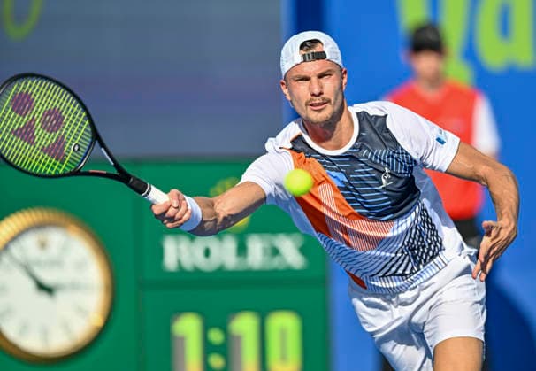 ATP, Tennis Herren QATAR EXXONMOBIL OPEN-ROUND OF Marton Fucsovics of Hungary competes against Karen Khachanov of Russia during their men s singles round of 16 match at the ATP Qatar Exxonmobil Open 2026 tennis tournament at the Khalifa International Tennis Complex in Doha, Qatar, on February 18, 2026. DOHA Qatar Copyright: xNOUSHADx