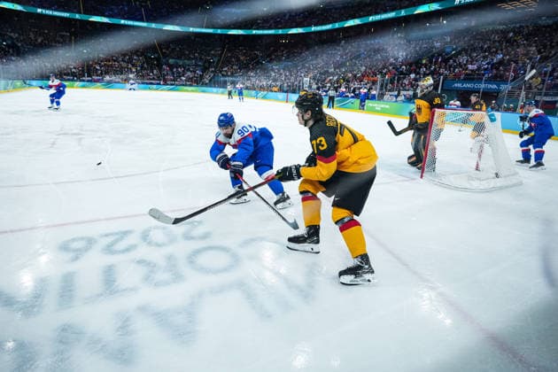 2026 Milano-Cortina Winter Olympics MILAN, ITALY - FEBRUARY 18: Tomas Tatar (90) of Slovakia in action against Lukas Reichel (73) of Germany during the quarterfinal Ice hockey, Eishockey match at the 2026 Milano-Cortina Winter Olympics at the Milano Santagiulia Ice Hockey Arena in Milan, Italy on February 18, 2026. Cemal Yurttas Anadolu Milan Italy. Editorial use only. Please get in touch for any other usage.  Copyright: x2026xAnadoluxCemalxYurttasx