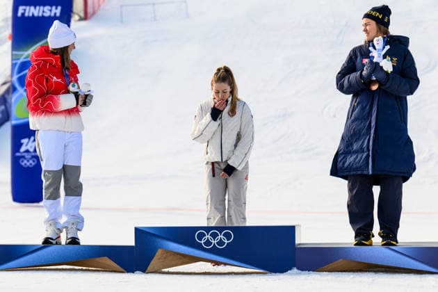 260218 Camille Rast of Switzerland, Mikaela Shiffrin of USA and Anna Swenn Larsson of Sweden on the podium after competing in women s alpine skiing slalom during day 12 of the 2026 Winter Olympics on February 18, 2026 in Cortina. Photo: Joel Marklund BILDBYRAN kod JM JM0797 bbeng alpint alpine skiing Olympic Games, Olympische Spiele, Olympia, OS olympics winter olympics os ol olympiska spel vinter-os olympiske leker milano cortina 2026 milan cortina 2026 milano cortina 2026 olympic games milano cortina 2026 winter olympic games milano cortina-os milano cortina-ol vinter-ol slalam dam sweden sverige *** 260218 Camille Rast of Switzerland, Mikaela Shiffrin of USA and Anna Swenn Larsson of Sweden on the podium after competing in women s alpine skiing slalom during day 12 of the 2026 Winter Olympics on February 18, 2026 in Cortina Photo Joel Marklund BILDBYRAN kod JM JM0797 bbeng alpint alpine skiing olympic games olympics winter olympics os ol olympiska spel vinter os olympiske leker milano cortina 2026 milan cortina 2026 milano cortina 2026 olympic games milano cortina 2026 winter olympic games milano cortina os milano cortina ol vinter ol slalam dam sweden sverige  Copyright: JOELxMARKLUND BB260218JM174