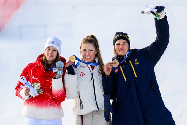 260218 Camille Rast of Switzerland, Mikaela Shiffrin of USA and Anna Swenn Larsson of Sweden on the podium after competing in women s alpine skiing slalom during day 12 of the 2026 Winter Olympics on February 18, 2026 in Cortina. Photo: Joel Marklund BILDBYRAN kod JM JM0797 bbeng alpint alpine skiing Olympic Games, Olympische Spiele, Olympia, OS olympics winter olympics os ol olympiska spel vinter-os olympiske leker milano cortina 2026 milan cortina 2026 milano cortina 2026 olympic games milano cortina 2026 winter olympic games milano cortina-os milano cortina-ol vinter-ol slalam dam sweden sverige *** 260218 Camille Rast of Switzerland, Mikaela Shiffrin of USA and Anna Swenn Larsson of Sweden on the podium after competing in women s alpine skiing slalom during day 12 of the 2026 Winter Olympics on February 18, 2026 in Cortina Photo Joel Marklund BILDBYRAN kod JM JM0797 bbeng alpint alpine skiing olympic games olympics winter olympics os ol olympiska spel vinter os olympiske leker milano cortina 2026 milan cortina 2026 milano cortina 2026 olympic games milano cortina 2026 winter olympic games milano cortina os milano cortina ol vinter ol slalam dam sweden sverige  Copyright: JOELxMARKLUND BB260218JM181