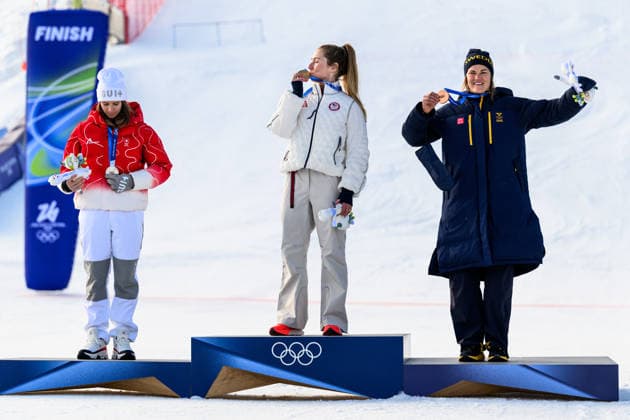 260218 Camille Rast of Switzerland, Mikaela Shiffrin of USA and Anna Swenn Larsson of Sweden on the podium after competing in women s alpine skiing slalom during day 12 of the 2026 Winter Olympics on February 18, 2026 in Cortina. Photo: Joel Marklund BILDBYRAN kod JM JM0797 bbeng alpint alpine skiing Olympic Games, Olympische Spiele, Olympia, OS olympics winter olympics os ol olympiska spel vinter-os olympiske leker milano cortina 2026 milan cortina 2026 milano cortina 2026 olympic games milano cortina 2026 winter olympic games milano cortina-os milano cortina-ol vinter-ol slalam dam sweden sverige *** 260218 Camille Rast of Switzerland, Mikaela Shiffrin of USA and Anna Swenn Larsson of Sweden on the podium after competing in women s alpine skiing slalom during day 12 of the 2026 Winter Olympics on February 18, 2026 in Cortina Photo Joel Marklund BILDBYRAN kod JM JM0797 bbeng alpint alpine skiing olympic games olympics winter olympics os ol olympiska spel vinter os olympiske leker milano cortina 2026 milan cortina 2026 milano cortina 2026 olympic games milano cortina 2026 winter olympic games milano cortina os milano cortina ol vinter ol slalam dam sweden sverige  Copyright: JOELxMARKLUND BB260218JM182