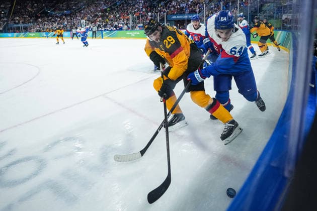 Milano-Cortina 2026 Winter Olympics MILAN, ITALY - FEBRUARY 18: Patrik Koch (64) of Slovakia in action against Leon Draisaitl (29) of Germany during the quarterfinal Ice hockey, Eishockey match at the 2026 Milano-Cortina Winter Olympics at the Milano Santagiulia Ice Hockey Arena in Milan, Italy on February 18, 2026. Cemal Yurttas Anadolu Milan Italy. Editorial use only. Please get in touch for any other usage.  Copyright: x2026xAnadoluxCemalxYurttasx