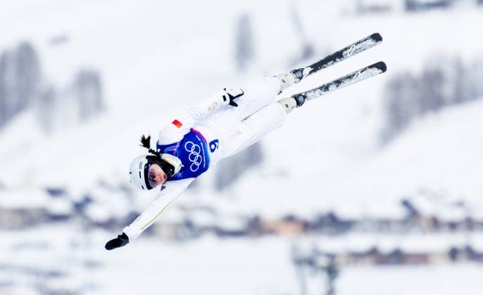 OLYMPICS - Winter Olympic Games, Olympische Spiele, Olympia, OS Milano Cortina 2026 LIVIGNO,ITALY,18.FEB.26 - OLYMPICS, FREE SKI, FREESTYLE SKIING - Winter Olympic Games Milano Cortina 2026, aerials, women, final. Image shows Qi Shao (CHN).  GEPAxpictures xHaraldxSteiner