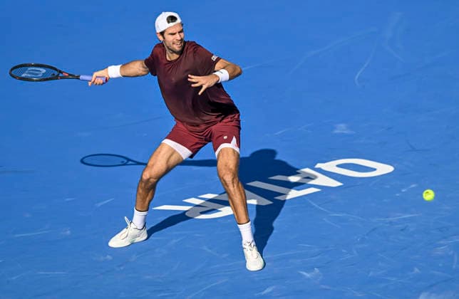 February 18, 2026, Doha, Qatar: Karen Khachanov of Russia is seen in action against Marton Fucsovics of Hungary ( not in view) during their men s singles round of 16 match at the ATP, Tennis Herren Qatar Exxonmobil Open 2026 tennis tournament at the Khalifa International Tennis Complex. Karen Khachanov won against Marton Fucsovics 6-2,4-6,6-4. Doha Qatar - ZUMAs197 20260218_aaa_s197_061 Copyright: xNoushadxVariyattiyakkalx