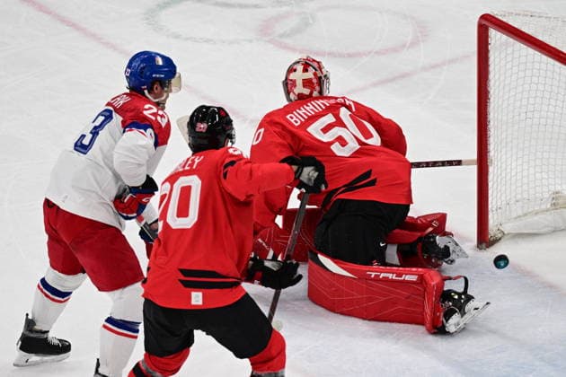 XXV Winter Olympic Games, Olympische Spiele, Olympia, OS in Milan, Italy, on February 18, 2026. Men s Ice hockey, Eishockey preliminary round playoffs, Czech Republic vs. Canada. David Pastrnak of Czech Republic (not pictured) scores second goal of Czech Team. From left Czech Lukas Sedlak, Thomas Harley, Jordan Binnington, goalie, both of Canada. (CTKxPhoto MichalxKamaryt) CTKPhotoP2026021808267  CTKPhotoP2026021808267
