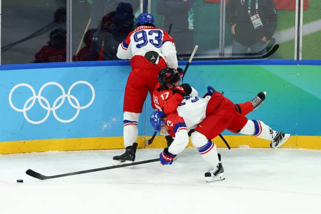 February 18, 2026, Milan, Lombardy, Italy: RADKO GUDAS 3 of Czechia roughs MACKLIN CELEBRINI 17 of Canada in the Quarterfinal game between Team Canada (CAN) and Team Czechia (CZE) at the Milano Cortina 2026 Olympic Games, Olympische Spiele, Olympia, OS Olympics 2026: Milano Cortina: Ice hockey, Eishockey Men: CAN:CZE  - ZUMAc179 20260218_oly_c179_063 Copyright: xMickaelxChavetx