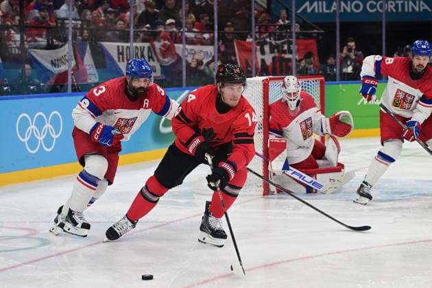 XXV Winter Olympic Games, Olympische Spiele, Olympia, OS in Milan, Italy, on February 18, 2026. Men s Ice hockey, Eishockey preliminary round playoffs, Czech Republic vs. Canada. from left Czech Radko Gudas, Bo Horvat of Canada, Czech Lukas Dostal, Tomas Hertl of Czech Republic. (CTKxPhoto MichalxKamaryt) CTKPhotoP2026021809115  CTKPhotoP2026021809115