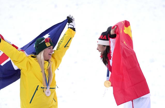 (260218) -- LIVIGNO, Feb. 18, 2026 -- Gold medalist Xu Mengtao (R) of China and silver medalist Danielle Scott of Australia interact during the awarding ceremony of the freestyle skiing women s aerials at the Milan-Cortina 2026 Olympic Winter games, Winterspiele,Spiele, Summer games in Livigno, Italy, Feb. 18, 2026. ) (MICO2026)ITALY-LIVIGNO-OLYMPIC WINTER GAMES-FREESTYLE SKIING-WOMEN S AERIALS-FINAL HuxChao 
