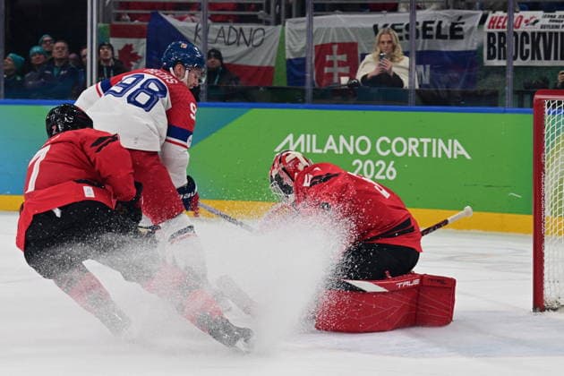 XXV Winter Olympic Games, Olympische Spiele, Olympia, OS in Milan, Italy, on February 18, 2026. Men s Ice hockey, Eishockey preliminary round playoffs, Czech Republic vs. Canada. From left Devon Toews of Canada, Czech Martin Necas, Jordan Binnington, goalie of Canada (CTKxPhoto MichalxKamaryt) CTKPhotoP2026021809452  CTKPhotoP2026021809452
