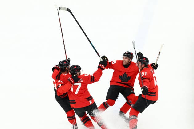 February 18, 2026, Milan, Lombardy, Italy: MITCH MARNER 93 of Canada celebrates with his teammates after scoring the winning goal during the overtime of the Quarterfinal game between Team Canada (CAN) and Team Czechia (CZE) at the Milano Cortina 2026 Olympic Games, Olympische Spiele, Olympia, OS Canada won 4:3. Olympics 2026: Milano Cortina: Ice hockey, Eishockey Men: CAN:CZE  - ZUMAc179 20260218_oly_c179_088 Copyright: xMickaelxChavetx