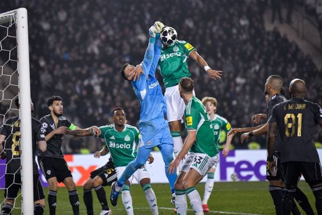 Malick Thiaw of Newcastle United Football Club jumps to win the ball over Mateusz Kochalski of Qarabag FK Qarabag v Newcastle United, UEFA Champions League, Knockout Round Play-Offs, First Leg, Football, Tofig Bahramov Republican Stadium, Baku, Azerbaijan - 18 Feb 2026Baku Tofig Bahramov Republican Stadiu Azerbaijan EDITORIAL USE ONLY No use with unauthorised audio, video, data, fixture lists, club league logos or live services. Online in-match use limited to 120 images, no video emulation. No use in betting, games or single club league player publications. Copyright: xElmirxKarimov Shutterstockx 16660416az