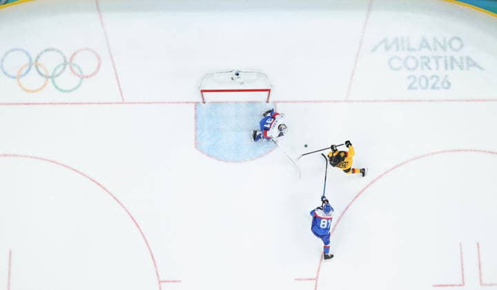 (260218) -- MILAN, Feb. 18, 2026 -- Tim Stutzle (R) of Germany scores during the Ice hockey, Eishockey men s play-offs quarterfinal between the Slovakia and Germany at the Milan-Cortina 2026 Olympic Winter games, Winterspiele,Spiele, Summer games in Milan, Italy, Feb. 18, 2026. ) (MICO2026)ITALY-MILAN-OLYMPIC WINTER GAMES-ICE HOCKEY-MEN-PLAY-OFFS QUARTERFINALS-SVK VS GER WangxKaiyan 
