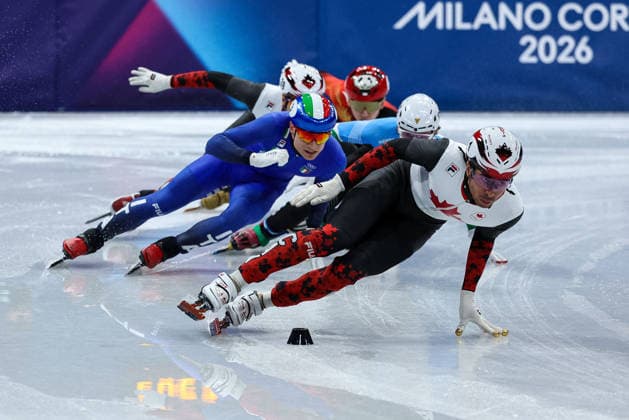 GIOCHI OLIMPICI - Olimpiadi Invernali Milano-Cortina 2026 - Short Track Speed skating, Eisschnelllauf Men s 500m Finals William Dandjinou (CAN) followed by Pietro Sighel (ITA) during the Olympic Winter games, Winterspiele,Spiele, Summer games Milano-Cortina 2026, Short Track Speed Skating Men s 500m Finals on February 18, 2026 at Milano Ice Skating Arena in Milan, Italy Cortina D Ampezzo Italy  Copyright: xIPAxSport ABACAx