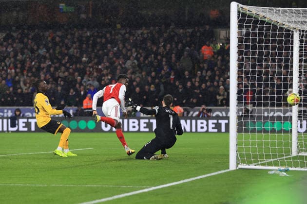 Football - Premier League - Wolverhampton Wanderers v Arsenal 18th February 2026 - Premier League - Wolverhampton Wanderers v Arsenal - Bukayo Saka of Arsenal scores the opening goal - Photo: Simon Stacpoole Offside. Wolverhampton UK Copyright: xSimonxStacpoolexOffside