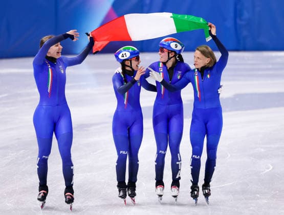 2026-02-18 Short Track Speed skating, Eisschnelllauf - Milano Cortina 2026 Winter Olympics - Day 12 MILAN, ITALY - FEBRUARY 18: Chiara Betti of Italy, Arianna Sighel of Italy, Elisa Confortola of Italy, Arianna Fontana of Italy celebrating with flag after competing in the Women s 3000m Relay during Day 12 of Short Track Speed Skating - Milano Cortina 2026 Winter Olympics at Milano Ice Skating Arena on February 18, 2026 in Milan, Italy. (Photo by Joris Verwijst BSR Agency) Milan Italy Content not available for redistribution in The Netherlands directly or indirectly through any third parties. Copyright: xBSRxAgencyx
