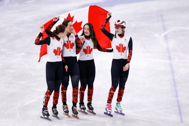 2026-02-18 Short Track Speed skating, Eisschnelllauf - Milano Cortina 2026 Winter Olympics - Day 12 MILAN, ITALY - FEBRUARY 18: Courtney Sarault of Canada, Danae Blais of Canada, Kim Boutin of Canada, Florence Brunelle of Canada celebrating with flag after competing in the Women s 3000m Relay during Day 12 of Short Track Speed Skating - Milano Cortina 2026 Winter Olympics at Milano Ice Skating Arena on February 18, 2026 in Milan, Italy. (Photo by Joris Verwijst BSR Agency) Milan Italy Content not available for redistribution in The Netherlands directly or indirectly through any third parties. Copyright: xBSRxAgencyx
