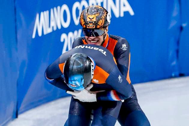 third Jens van t Wout of the Netherlands and second Melle van t Wout of the Netherlands celebrates after Men s 500m Finals, Milano Cortina 2026 Winter Olympics: Day 12, Short Track Speed skating, Eisschnelllauf - Milano Cortina 2026 Winter Olympics: Day 12, Milano Speed Skating Stadium, February 18, 2026, Milan, Italy.