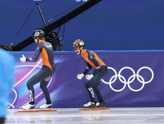 Winter Olympics - Brothers Melle and Jens van T Wout Win Silver And Bronze At Speed skating, Eisschnelllauf Men s 500m Dutch athletes and brothers, (R) Jens and (L) Melle van T Wout of Team Netherlands celebrate together after Melle wins silver medal and Jens wins bronze medal at the Short Track Speed Skating Men s 500m on day twelve of the Milano Cortina 2026 Winter Olympic Games, Olympische Spiele, Olympia, OS at Milano Ice Skating Arena on February 18, 2026 in Milan, Italy. Photo by Alexis Jumeau ABACAPRESS.COM Milan Italy  Copyright: xJumeauxAlexis ABACAx