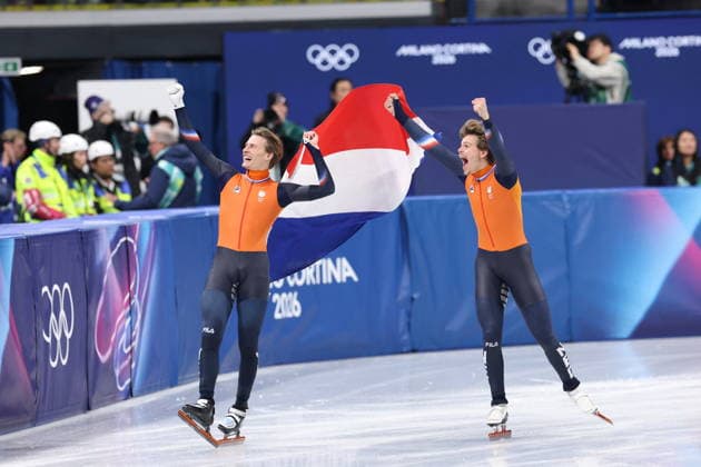 Winter Olympics - Brothers Melle and Jens van T Wout Win Silver And Bronze At Speed skating, Eisschnelllauf Men s 500m Dutch athletes and brothers, (L) Jens and (R) Melle van T Wout of Team Netherlands celebrate together after Melle wins silver medal and Jens wins bronze medal at the Short Track Speed Skating Men s 500m on day twelve of the Milano Cortina 2026 Winter Olympic Games, Olympische Spiele, Olympia, OS at Milano Ice Skating Arena on February 18, 2026 in Milan, Italy. Photo by Alexis Jumeau ABACAPRESS.COM Milan Italy  Copyright: xJumeauxAlexis ABACAx