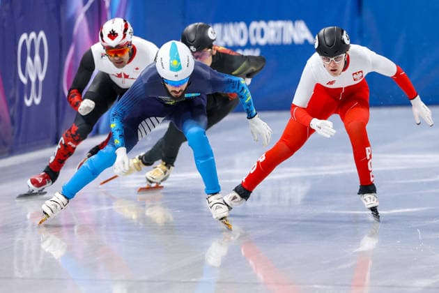 Winter Olympics - Speed skating, Eisschnelllauf Men s 500m Daniil Eybog of Team Uzbekistan and Felix Pigeon of Team Poland compete during the Short Track Speed Skating Men s 500m on day twelve of the Milano Cortina 2026 Winter Olympic Games, Olympische Spiele, Olympia, OS at Milano Ice Skating Arena on February 18, 2026 in Milan, Italy. Photo by Alexis Jumeau ABACAPRESS.COM Milan Italy  Copyright: xJumeauxAlexis ABACAx