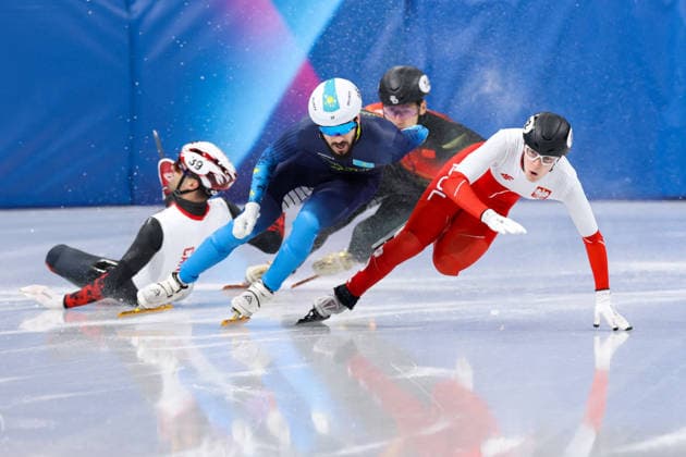 Winter Olympics - Speed skating, Eisschnelllauf Men s 500m Maxime Laoun crashes while Denis Nikisha of Team Kazakhstan and Felix Pigeon of Team Poland compete during the Short Track Speed Skating Men s 500m on day twelve of the Milano Cortina 2026 Winter Olympic Games, Olympische Spiele, Olympia, OS at Milano Ice Skating Arena on February 18, 2026 in Milan, Italy. Photo by Alexis Jumeau ABACAPRESS.COM Milan Italy  Copyright: xJumeauxAlexis ABACAx