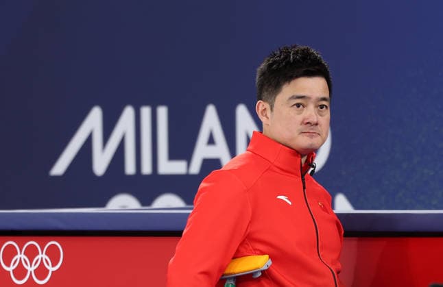 (260218) -- CORTINA D AMPEZZO, Feb. 18, 2026 -- Xu Xiaoming of China competes during the curling men s round robin session 11 match between the Czech Republic and China at the 2026 Milan-Cortina Winter Olympics in Cortina, Italy, Feb. 18, 2026. ) (MICO2026)ITALY-CORTINA D AMPEZZO-OLYMPIC Winter games, Winterspiele,Spiele, Summer games CURLING-MEN-ROUND ROBIN-CHN VS CZE DingxXu 