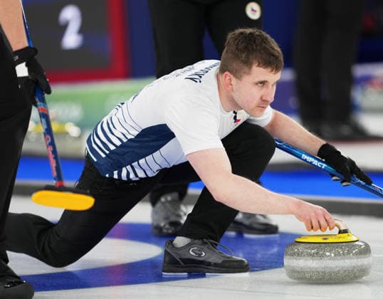 (260218) -- CORTINA D AMPEZZO, Feb. 18, 2026 -- Marek Cernovsky of the Czech Republic competes during the curling men s round robin session 11 match between the Czech Republic and China at the 2026 Milan-Cortina Winter Olympics in Cortina, Italy, Feb. 18, 2026. ) (MICO2026)ITALY-CORTINA D AMPEZZO-OLYMPIC Winter games, Winterspiele,Spiele, Summer games CURLING-MEN-ROUND ROBIN-CHN VS CZE LixGang 