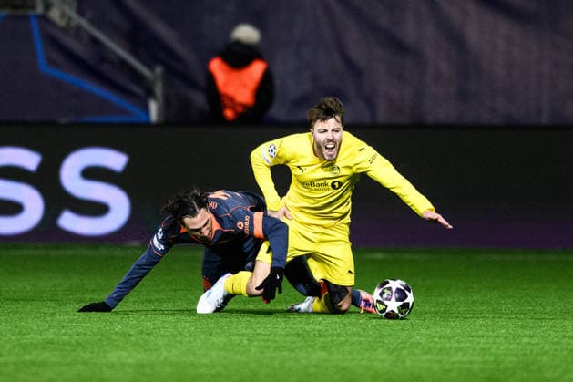 260218 Matteo Darmian of Inter and Fredrik AndrÃ Bjorkan of Bodo Glimt during the UEFA Champions League football match between Bodo Glimt and Inter on February 18, 2026 in Bodo. Photo: Marius Simensen BILDBYRAN COP 238 MM0055 bbeng football fotball fotboll soccer uefa champions league mesterligaen bodo glimt inter fc internazionale milano Copyright: MARIUSxSIMENSEN BB260218ZW139