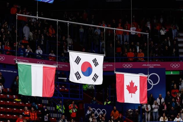 MILAN , 18-02-2026 , Milano Ice Skating Arena , Olympic Winter games, Winterspiele,Spiele, Summer games 2026 - Short Track 18-02 Women™s 3000m relay, Picture shows team Italy (silver) , Republic of Korea (gold), Canada (bronze) Flags Olympic Winter Games 2026 - Short Track 18-02  x201715649x Copyright: