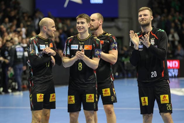 18.02.2026, xgox, Handball, EHF Champions League, SC Magdeburg - GOG Handbold v.l. Tim Hornke (Magdeburg, 17), Manuel Zehnder (Magdeburg, 8), Tim Zechel (Magdeburg, 9), Philipp Weber (Magdeburg, 20) Jubel ueber den Sieg, Jubel nach Spielende Magdeburg