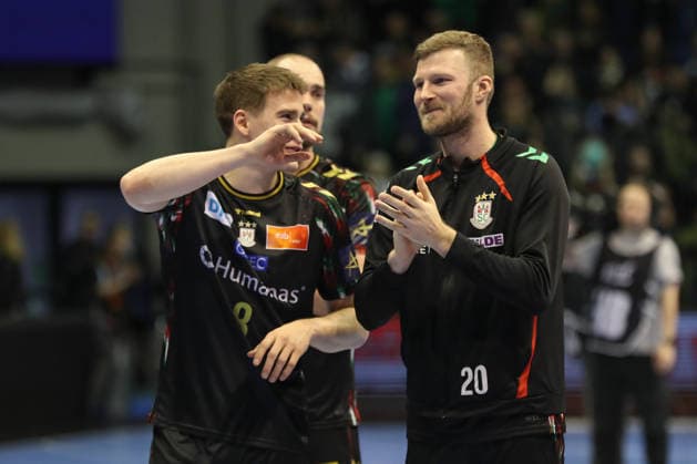 18.02.2026, xgox, Handball, EHF Champions League, SC Magdeburg - GOG Handbold v.l. Manuel Zehnder (Magdeburg, 8), Philipp Weber (Magdeburg, 20) Jubel ueber den Sieg, Jubel nach Spielende Magdeburg