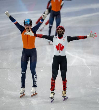 February 18, 2026, Milano, Lombardy, Italy: Steven Dubois (4) of Canada celebrate winning the gold medal and Melle van t Wout (121) of the Netherlands the silver medal in the Short Track Speed skating, Eisschnelllauf Men 500m Final during the 2026 Winter Olympics at the Milano Ice Skating Arena on Wednesday in Milano. Milano Italy - ZUMAj89_ 20260218_oly_j89_009 Copyright: xPaulxKitagakixJr.x