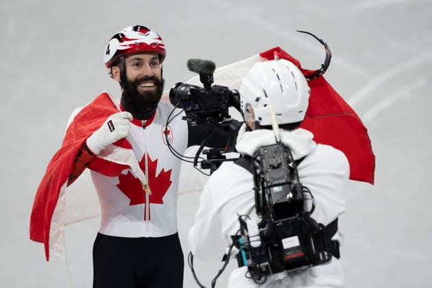 February 18, 2026, Milano, Lombardy, Italy: Steven Dubois (4) of Canada celebrate winning the gold medal in the Short Track Speed skating, Eisschnelllauf Men 500m Final during the 2026 Winter Olympics at the Milano Ice Skating Arena on Wednesday in Milano. Olympics 2026: Milano Cortina: Short Track Speed Skating Men s  - ZUMAj89_ 20260218_oly_j89_017 Copyright: xPaulxKitagakixJr.x