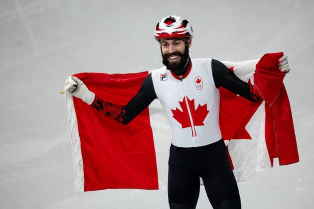 February 18, 2026, Milano, Lombardy, Italy: Steven Dubois (4) of Canada celebrate winning the gold medal in the Short Track Speed skating, Eisschnelllauf Men 500m Final during the 2026 Winter Olympics at the Milano Ice Skating Arena on Wednesday in Milano. Olympics 2026: Milano Cortina: Short Track Speed Skating Men s  - ZUMAj89_ 20260218_oly_j89_018 Copyright: xPaulxKitagakixJr.x