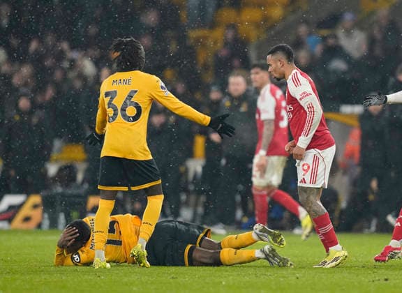 Wolverhampton, England, 18th February 2026. Gabriel Jesus of Arsenal clashes with Yerson Mosquera of Wolverhampton Wanderers after the final whistle during the Wolverhampton Wanderers vs Arsenal Premier League match at Molineux, Wolverhampton. Picture credit should read: Andrew Yates Sportimage EDITORIAL USE ONLY. No use with unauthorised audio, video, data, fixture lists, club league logos or live services. Online in-match use limited to 120 images, no video emulation. No use in betting, games or single club league player publications. SPI_066_AY_Wolves_Arsenal SPI-4539-0068