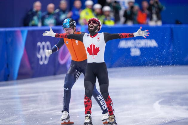 2026-02-18 - Milano Cortina 2026 Winter Olympics MILAN, ITALY - FEBRUARY 18: Melle van t Wout of Netherlands, Steven Dubois of Canada performing on the Short Track Speed skating, Eisschnelllauf during day 14 of the Milano Cortina 2026 Winter Olympics at the Milano Ice Skating Arena on February 18, 2026 in Milan, Italy Milan Milano Ice Skating Arena Italy Content not available for redistribution in The Netherlands directly or indirectly through any third parties. Copyright: xAndrexWeeningx