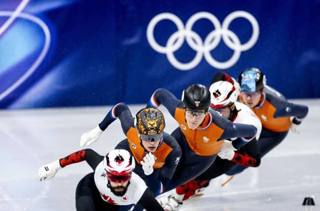 MILAN - Jens van t Wout, Teun Boer, and Melle van t Wout during the 500-meter short track Speed skating, Eisschnelllauf final at the Milan Ice Skating Area at the Milan Winter Olympics. ROBIN VAN LONKHUIJSEN ANP xVIxANPxSportx xxANPxIVx 551129186 originalFilename: 551129186.jpg