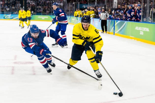 260218 Quinn Hughes of USA and Philip Broberg of Sweden in the men s Ice hockey, Eishockey quarterfinal between USA and Sweden during day 12 of the 2026 Winter Olympics on February 18, 2026 in Milan. Photo: Carl Sandin BILDBYRAN kod CS EW0641 ishockey ice hockey Olympic Games, Olympische Spiele, Olympia, OS olympics winter olympics os ol olympiska spel vinter-os olympiske leker milano cortina 2026 milan cortina 2026 milano cortina 2026 olympic games milano cortina 2026 winter olympic games milano cortina-os milano cortina-ol vinter-ol 12 bbeng sverige sweden usa quarterfinal kvartsfinal *** 260218 Quinn Hughes of USA and Philip Broberg of Sweden in the men s ice hockey quarterfinal between USA and Sweden during day 12 of the 2026 Winter Olympics on February 18, 2026 in Milan Photo Carl Sandin BILDBYRAN code CS EW0641 ice hockey ice hockey olympic games olympics winter olympics os ol olympiska spel vinter os olympiske leker milano cortina 2026 milan cortina 2026 milano cortina 2026 olympic games milano cortina 2026 winter olympic games milano cortina os milano cortina ol vinter ol 12 bbeng sverige sweden usa quarterfinal kvartfinal  Copyright: CARLxSANDIN BB260218CS082