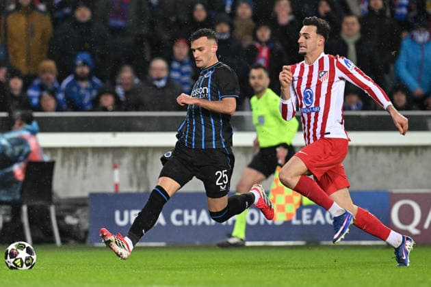 260218 Club Brugge vs Atletico Madrid Aleksandar Stankovic (25) of Club Brugge and Marc Pubill (18) of Atletico pictured in action during the Uefa Champions League Knock Out play offs first leg in season 2025 - 2026 between Club Brugge KV and Atletico de Madrid on February 18 , 2026 in Brugge, Belgium. (Photo by David Catry Isosport) Brugge Belgium  Copyright: xDavidxCatryx 20260218DC2_4507