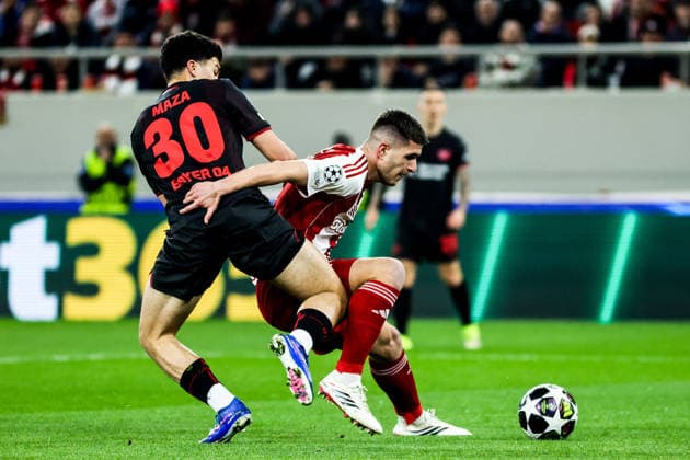 Olympiacos v Bayer Leverkusen - UEFA Champions League PIRAEUS, GREECE - FEBRUARY 18: Olympiacos player Costinha in action with Bayer Leverkusen player Ibrahim Maza during the UEFA Champions League match between Olympiacos Piraeus and Bayer Leverkusen for the 2025-26 season at Karaiskaki Stadium in Piraeus, Greece, on February 18, 2026. Andreas Papakonstantinou Anadolu Piraeus Greece. Editorial use only. Please get in touch for any other usage.  Copyright: x2026xAnadoluxAndreasxPapakonstantinoux
