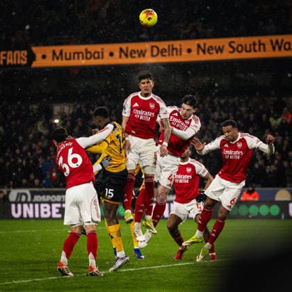 18th February 2026; Molineux Stadium, Wolverhampton, West Midlands, England; Premier League Football, Wolverhampton Wanderers versus Arsenal; Piero Hincapie of Arsenal wins a defensive header ahead of Declan Rice  GodfreyxPitt Content restricted for UK based newspaper