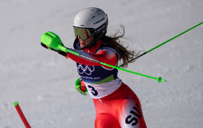 260218 -- CORTINA D AMPEZZO, Feb. 18, 2026 -- Camille Rast of Switzerland competes during the alpine skiing women s slalom run 1 at the Milan-Cortina 2026 Olympic Winter games, Winterspiele,Spiele, Summer games in Cortina, Italy, Feb. 18, 2026. MICO2026ITALY-CORTINA D AMPEZZO-OLYMPIC WINTER GAMES-ALPINE SKIING-WOMEN S SLALOM FeixMaohua  (MICO2026)ITALY-CORTINA D AMPEZZO-OLYMPIC WINTER GAMES-ALPINE SKIING-WOMEN S SLALOM IMAGO FeixMaohua  imago images 0847986609