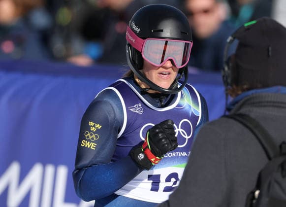260218 -- CORTINA D AMPEZZO, Feb. 18, 2026 -- Anna Swenn Larsson of Sweden celebrates after the alpine skiing women s slalom run 2 at the Milan-Cortina 2026 Olympic Winter games, Winterspiele,Spiele, Summer games in Cortina, Italy, Feb. 18, 2026. MICO2026ITALY-CORTINA D AMPEZZO-OLYMPIC WINTER GAMES-ALPINE SKIING-WOMEN S SLALOM ZhangxChenlin  (MICO2026)ITALY-CORTINA D AMPEZZO-OLYMPIC WINTER GAMES-ALPINE SKIING-WOMEN S SLALOM IMAGO ZhangxChenlin  imago images 0847986619