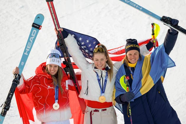 260218 -- CORTINA D AMPEZZO, Feb. 18, 2026 -- Gold medalist Mikaela Shiffrin C of the United States, silver medalist Camille Rast L of Switzerland, and bronze medalist Anna Swenn Larsson of Sweden pose for photos during the awarding ceremony of the alpine skiing women s slalom at the Milan-Cortina 2026 Olympic Winter games, Winterspiele,Spiele, Summer games in Cortina, Italy, Feb. 18, 2026. MICO2026ITALY-CORTINA D AMPEZZO-OLYMPIC WINTER GAMES-ALPINE SKIING-WOMEN S SLALOM FeixMaohua  (MICO2026)ITALY-CORTINA D AMPEZZO-OLYMPIC WINTER GAMES-ALPINE SKIING-WOMEN S SLALOM IMAGO FeixMaohua  imago images 0847986635