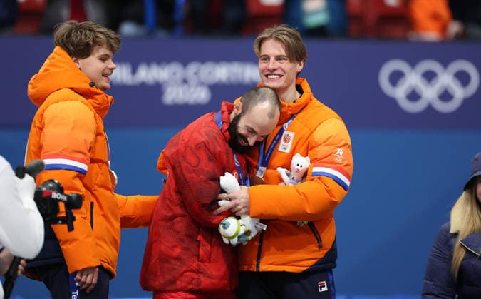 260218 -- MILAN, Feb. 18, 2026 -- Gold medalist Steven Dubois C of Canada, silver medalist Melle van t Wout L of the Netherlands, and bronze medalist Jens van t Wout of the Netherlands celebrate during the awarding ceremony of the short track Speed skating, Eisschnelllauf men s 500m at the Milan-Cortina 2026 Olympic Winter games, Winterspiele,Spiele, Summer games in Milan, Italy, Feb. 18, 2026. MICO2026ITALY-MILAN-OLYMPIC WINTER GAMES-SHORT TRACK SPEED SKATING-MEN S 500M-FINALS LixMing  (MICO2026)ITALY-MILAN-OLYMPIC WINTER GAMES-SHORT TRACK SPEED SKATING-MEN S 500M-FINALS IMAGO LixMing  imago images 0847990035