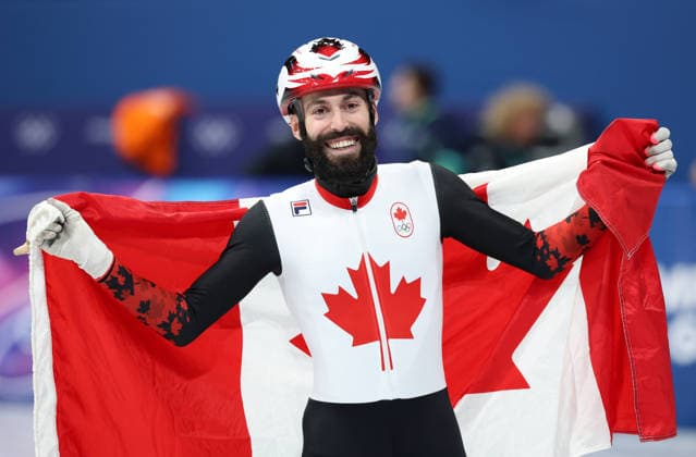 260218 -- MILAN, Feb. 18, 2026 -- Steven Dubois of Canada celebrates after the short track Speed skating, Eisschnelllauf men s 500m final A at the Milan-Cortina 2026 Olympic Winter games, Winterspiele,Spiele, Summer games in Milan, Italy, Feb. 18, 2026. MICO2026ITALY-MILAN-OLYMPIC WINTER GAMES-SHORT TRACK SPEED SKATING-MEN S 500M-FINALS LixMing  (MICO2026)ITALY-MILAN-OLYMPIC WINTER GAMES-SHORT TRACK SPEED SKATING-MEN S 500M-FINALS IMAGO LixMing  imago images 0847990086