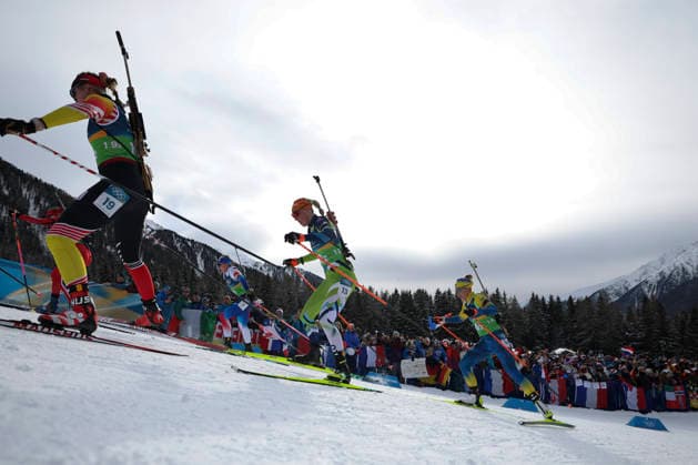(260219) -- ANTERSELVA, Feb. 19, 2026 -- Maya Cloetens (1st L) of Belgium, Lucie Charvatova (2nd L) of the Czech Republic, Anamarija Lampic (2nd R) of Slovenia and Yuliia Dzhima of Ukraine compete during the biathlon women s 4x6km relay at the 2026 Milan-Cortina Winter Olympics in Anterselva, Italy, Feb. 18, 2026. ) (MICO2026)ITALY-ANTERSELVA-OLYMPIC Winter games, Winterspiele,Spiele, Summer games BIATHLON-WOMEN S 4x6KM RELAY ZhangxTao 