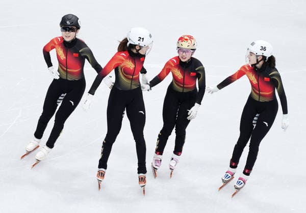 (260219) -- MILAN, Feb. 19, 2026 -- Gong Li, Zhang Chutong, Yang Jingru and Wang Xinran (from L to R) of China celebrate after the short track Speed skating, Eisschnelllauf women s 3000m relay final B at the Milan-Cortina 2026 Olympic Winter games, Winterspiele,Spiele, Summer games in Milan, Italy, Feb. 18, 2026. ) (MICO2026)ITALY-MILAN-OLYMPIC WINTER GAMES-SHORT TRACK SPEED SKATING-WOMEN S 3000M RELAY-FINALS XuexYuge 